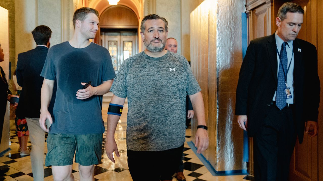 Sen. Ted Cruz, seen here outside the Senate chamber in workout clothes in August 2022.